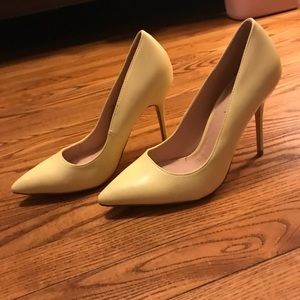 Yellow high heels